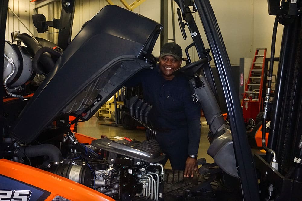 forklift mechanic working in a C & B Material Handling location